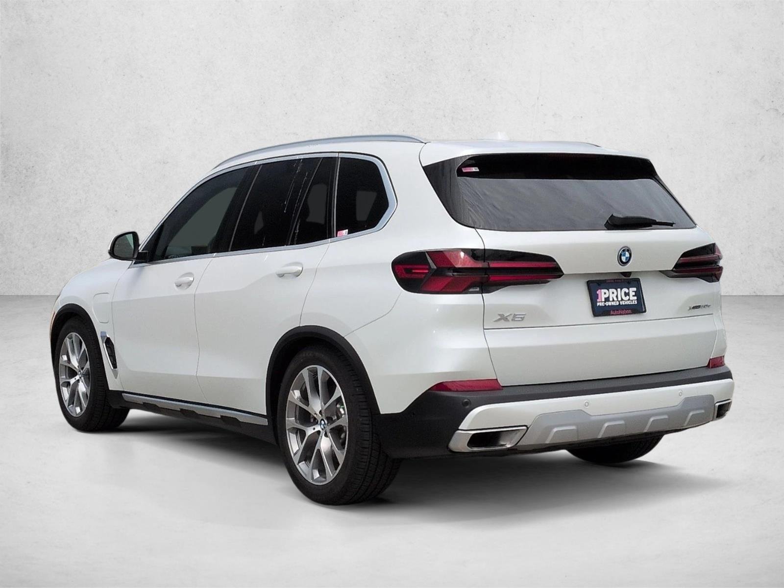 Used 2026 Mineral White Metallic BMW xDrive50e image 8