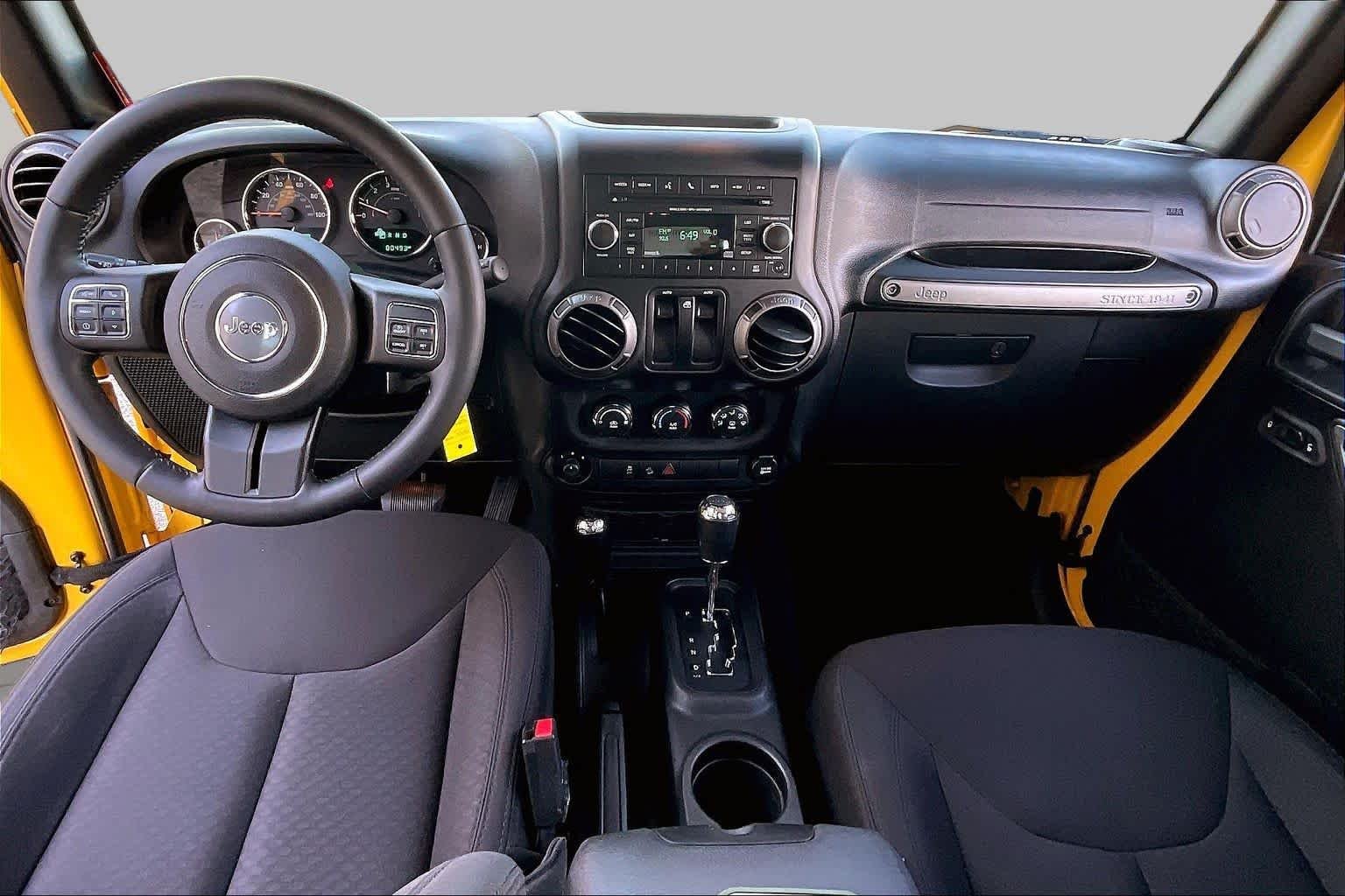 Used 2015 Baja Yellow Clearcoat Jeep Sport image 14
