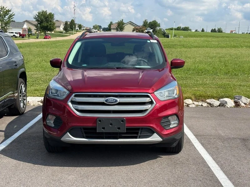 Used 2017 Ruby Red Metallic Tinted Clearcoat Ford SE image 2