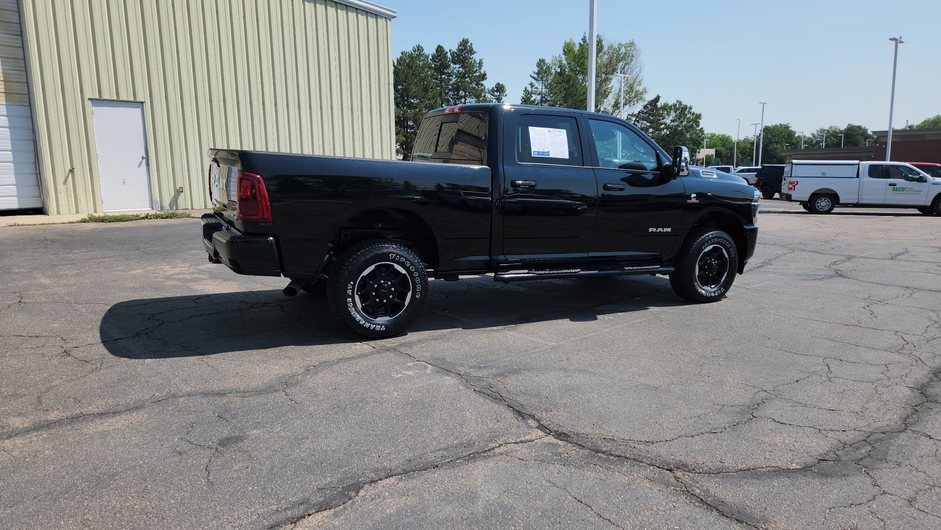 Used 2025 Diamond Black Crystal Pearlcoat Ram Laramie image 10