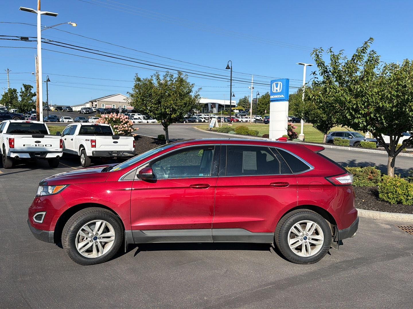 Used 2018 Ruby Red Metallic Tinted Clearcoat Ford SEL image 4
