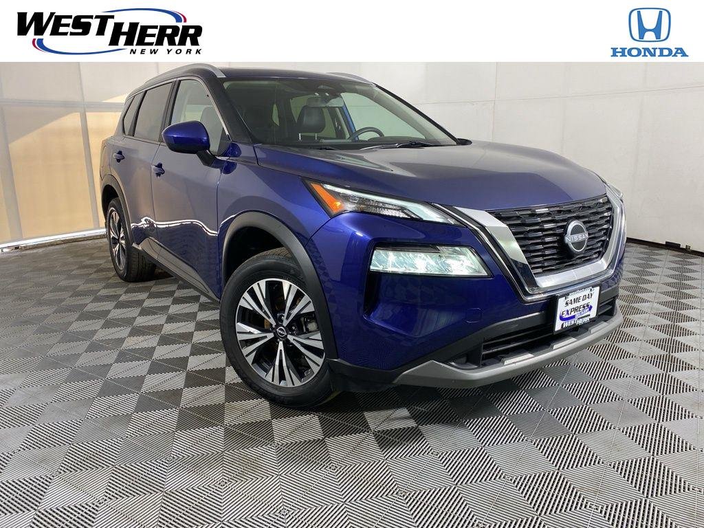 Used 2023 Caspian Blue Metallic Nissan SV image 1