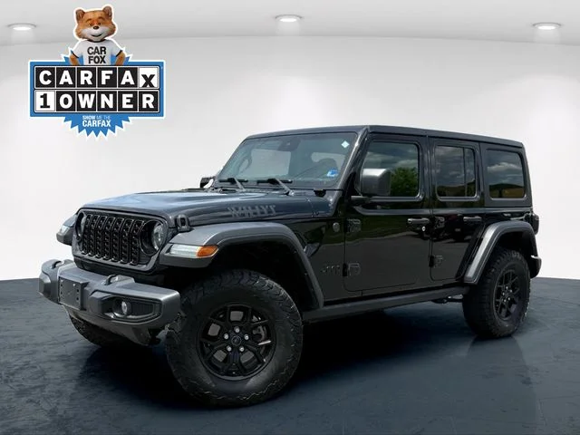 Used 2024 Black Jeep Sport image 1