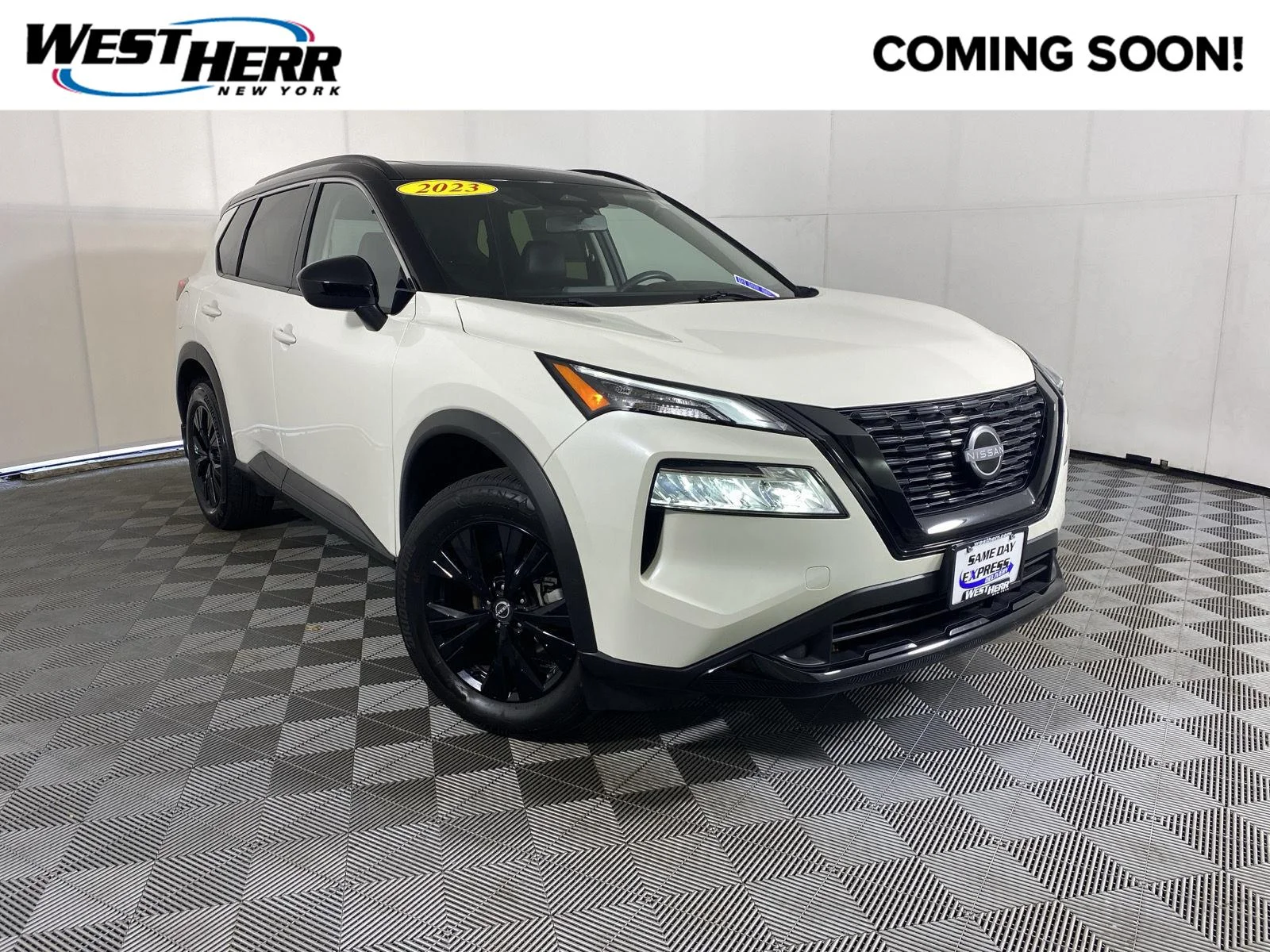 Used 2023 Pearl White Tricoat/Super Black Nissan SV image 1