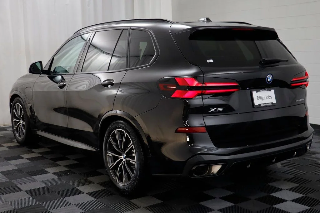 New 2026 Black BMW xDrive50e image 16