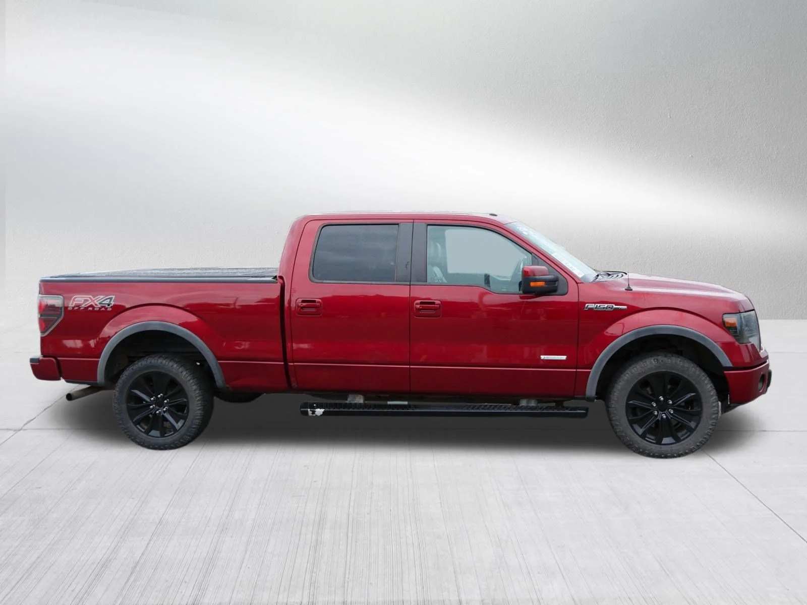 Used 2014 Ruby Red Metallic Tinted Clearcoat Ford FX4 image 8