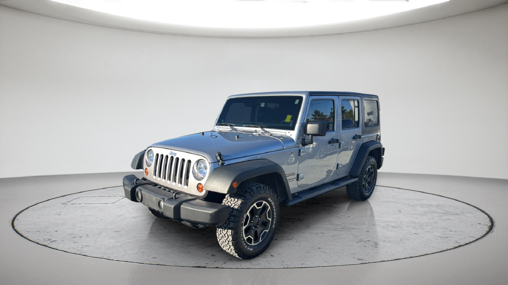 Used 2013 Silver Jeep Unlimited Sport image 2