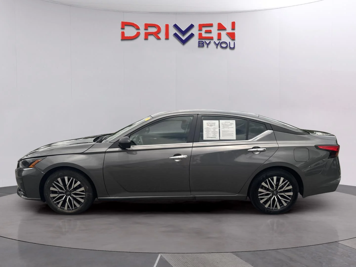 Used 2025 Gun Metallic Nissan SV image 2