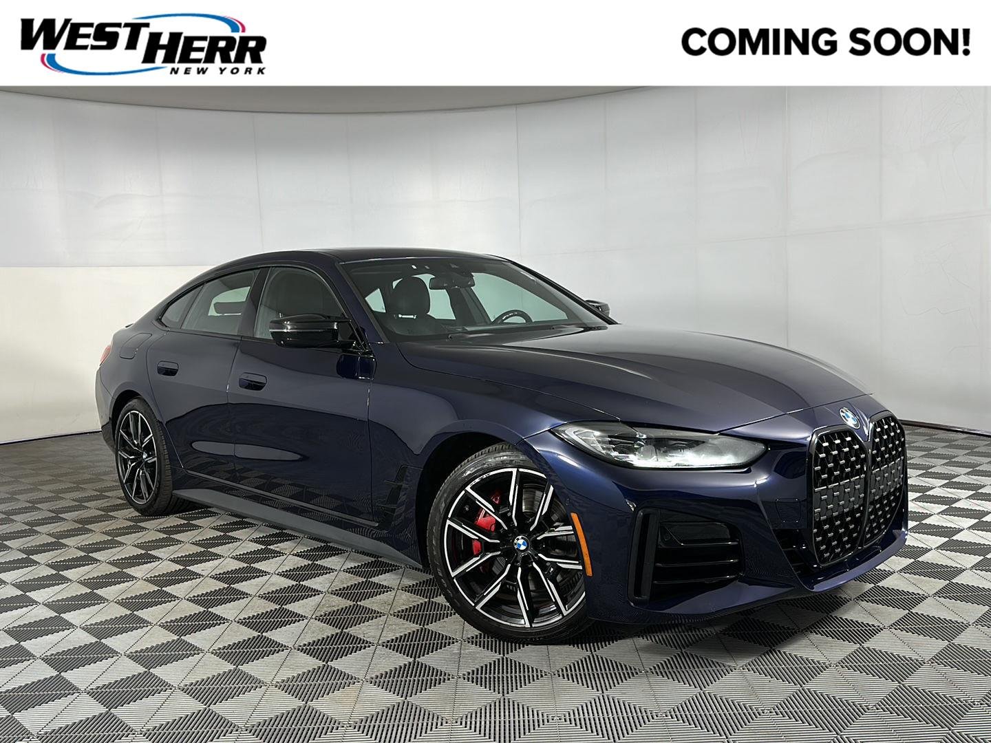 Used 2024 Tanzanite Blue II Metallic BMW M440i xDrive image 1