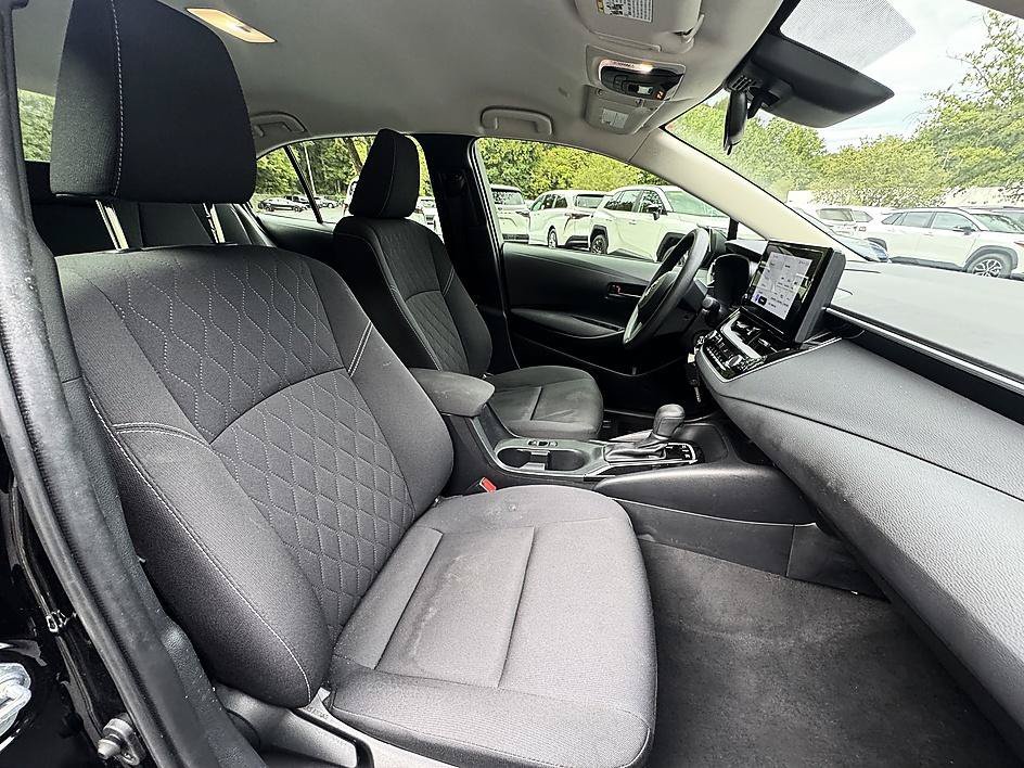 Used 2024 Midnight Black Metallic Toyota Hybrid LE image 19