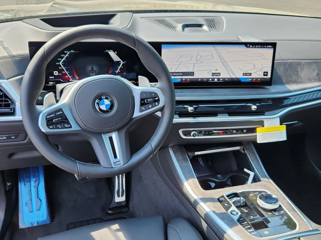 New 2026 Black Sapphire Metallic BMW M60i image 11