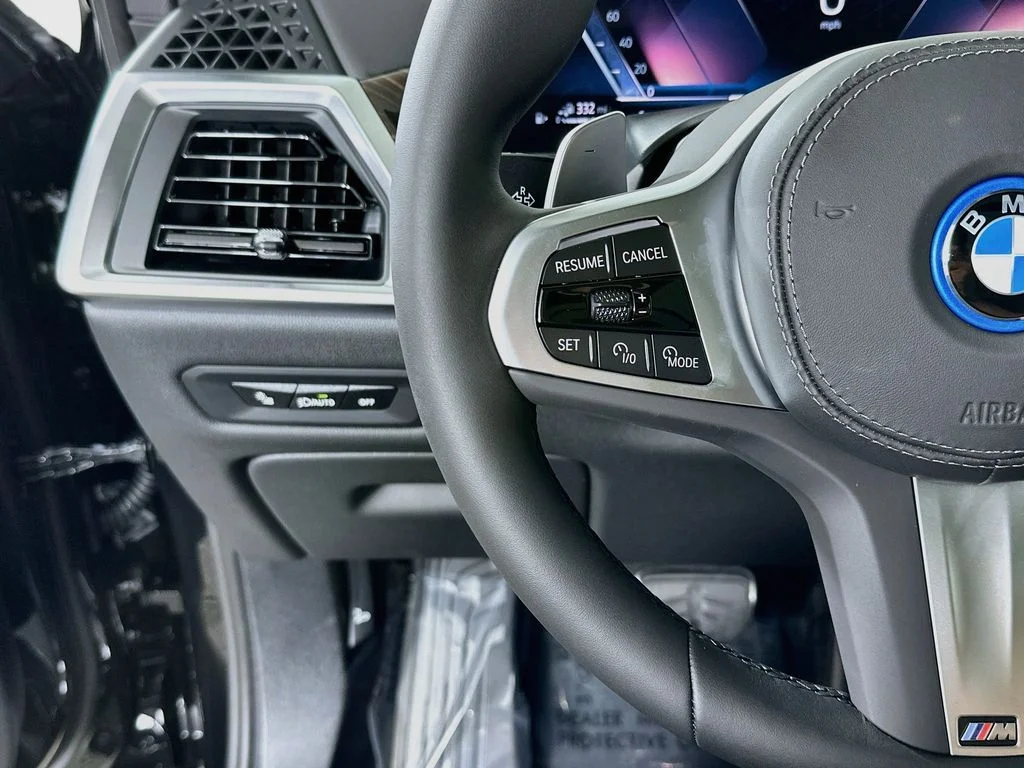 New 2026 Black Sapphire Metallic BMW xDrive50e image 13