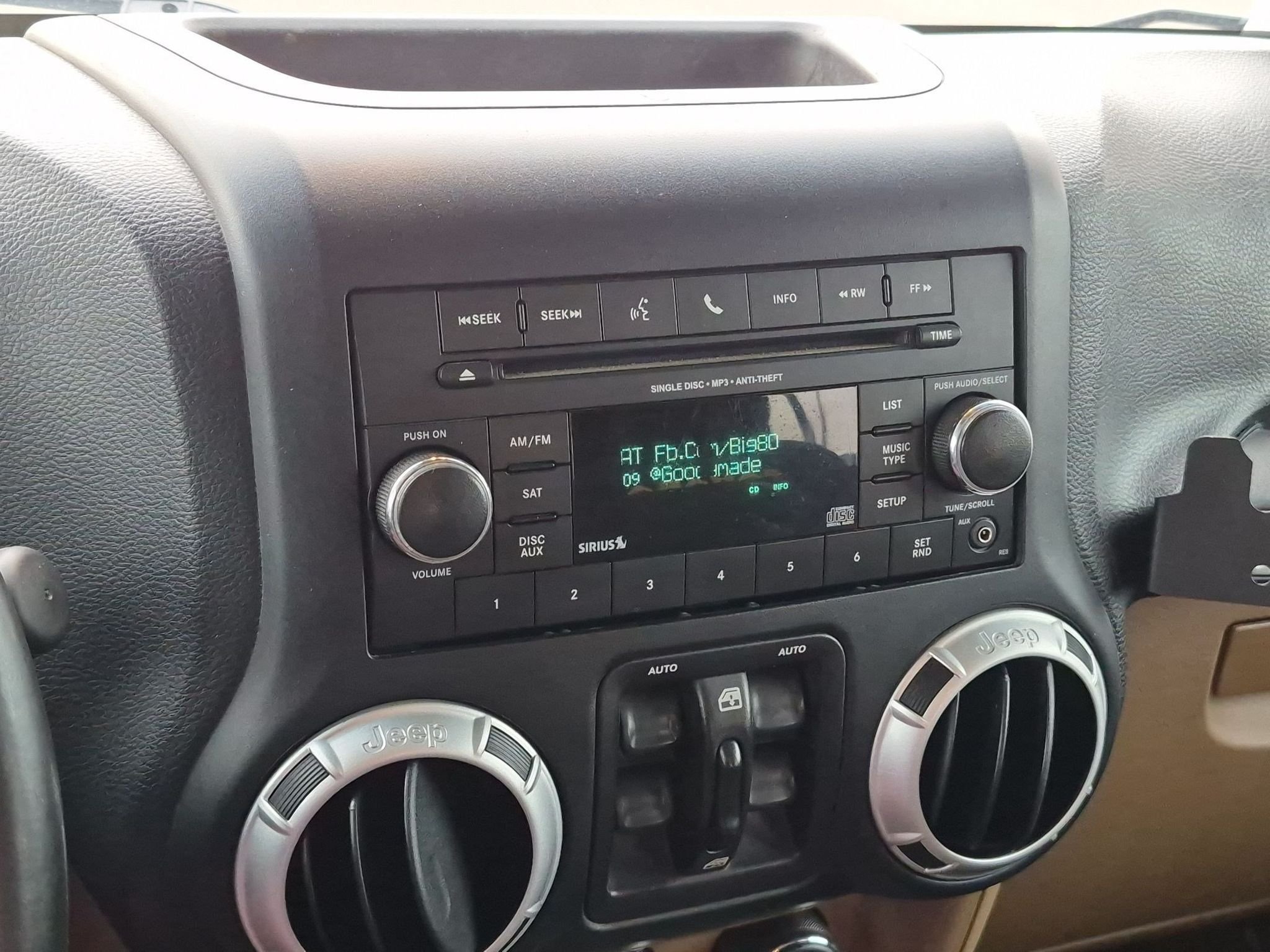 Used 2015 Black Clearcoat Jeep Sahara image 13