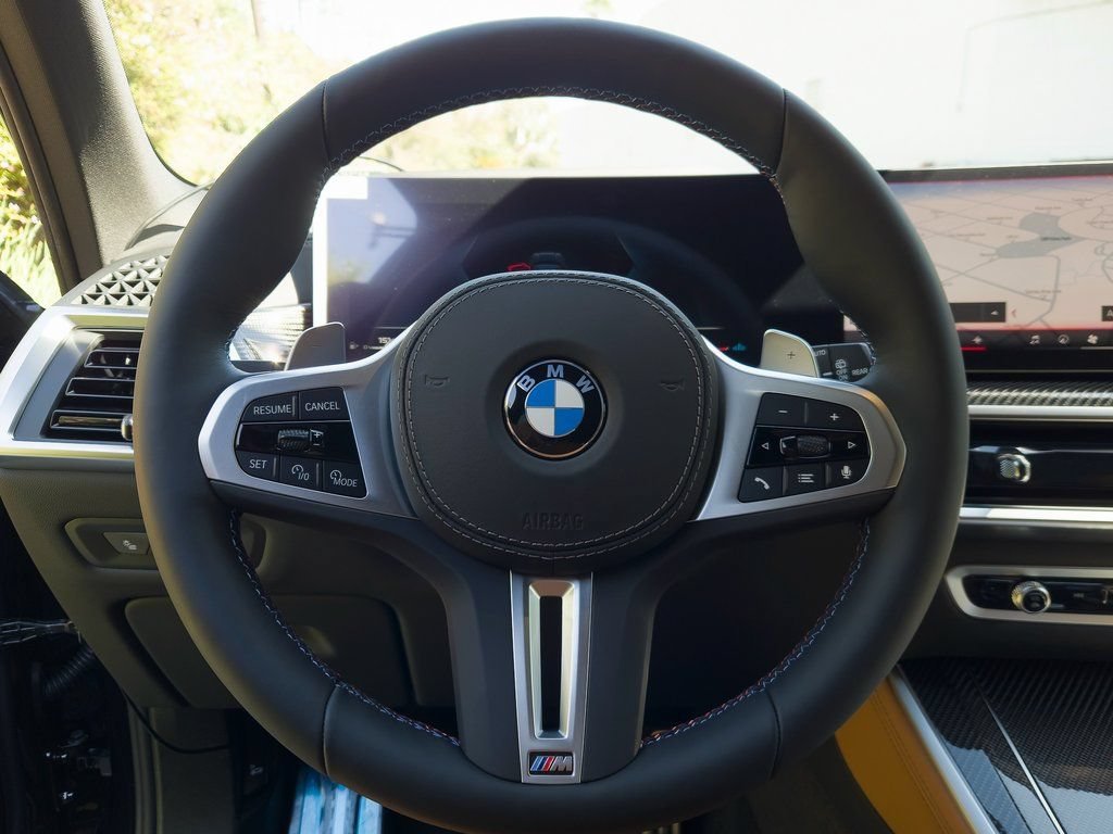 New 2026 Black Sapphire Metallic BMW M60i image 11