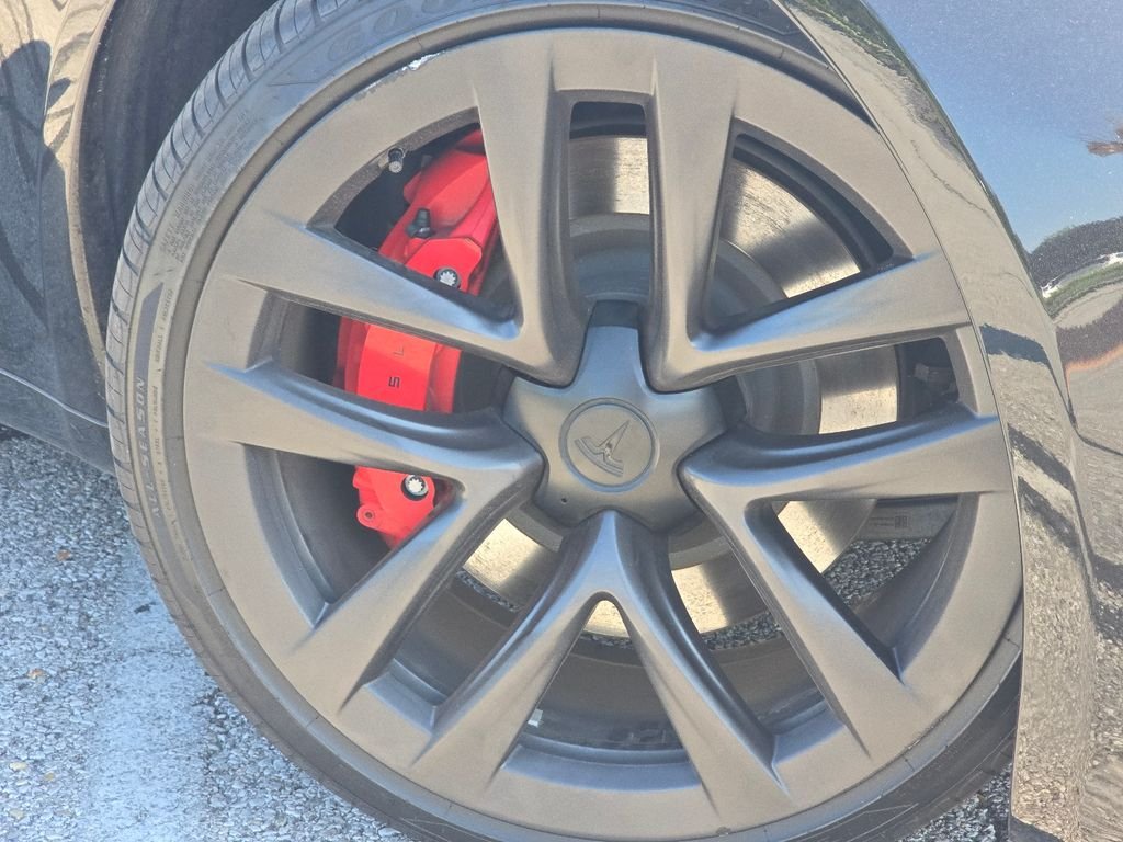 Used 2024 Solid Black Tesla Plaid image 7