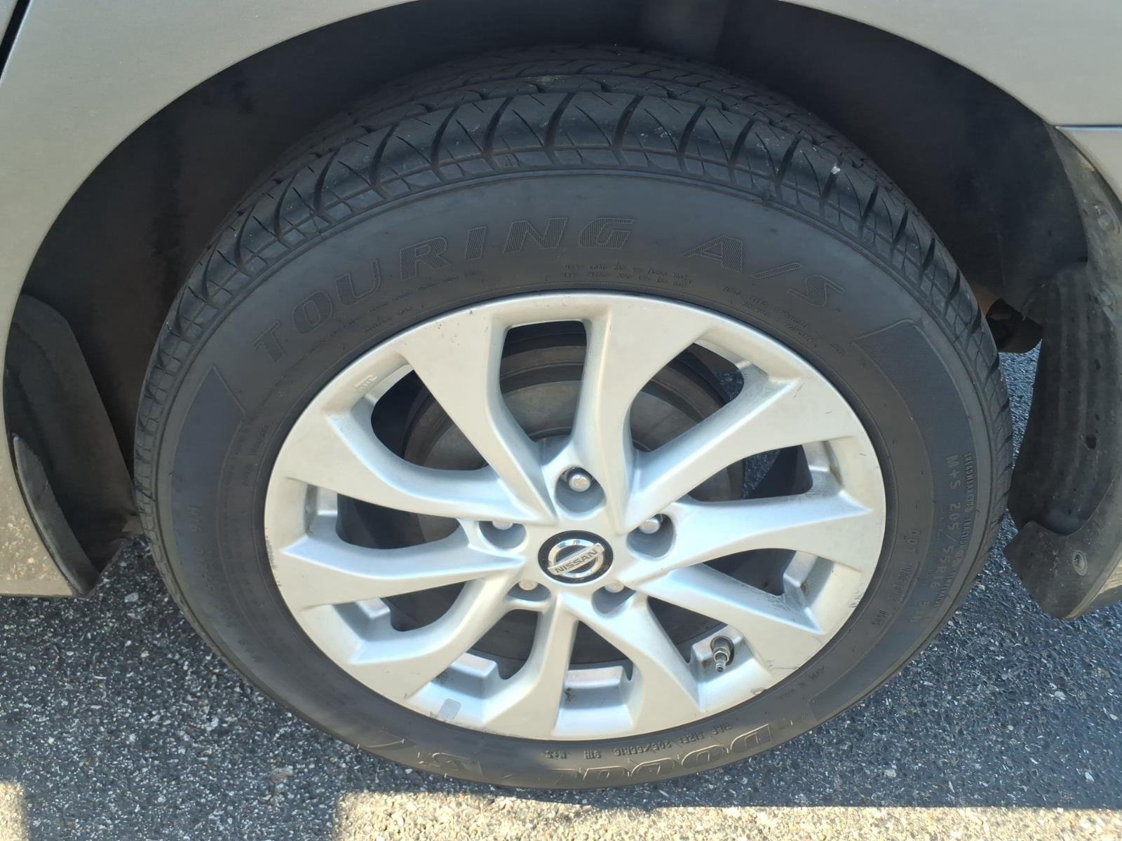 Used 2016 Gun Metallic Nissan SV image 9