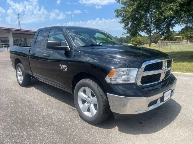 Pre-Owned 2024 Ram 1500 Classic SLT 4WD 4D Quad Cab