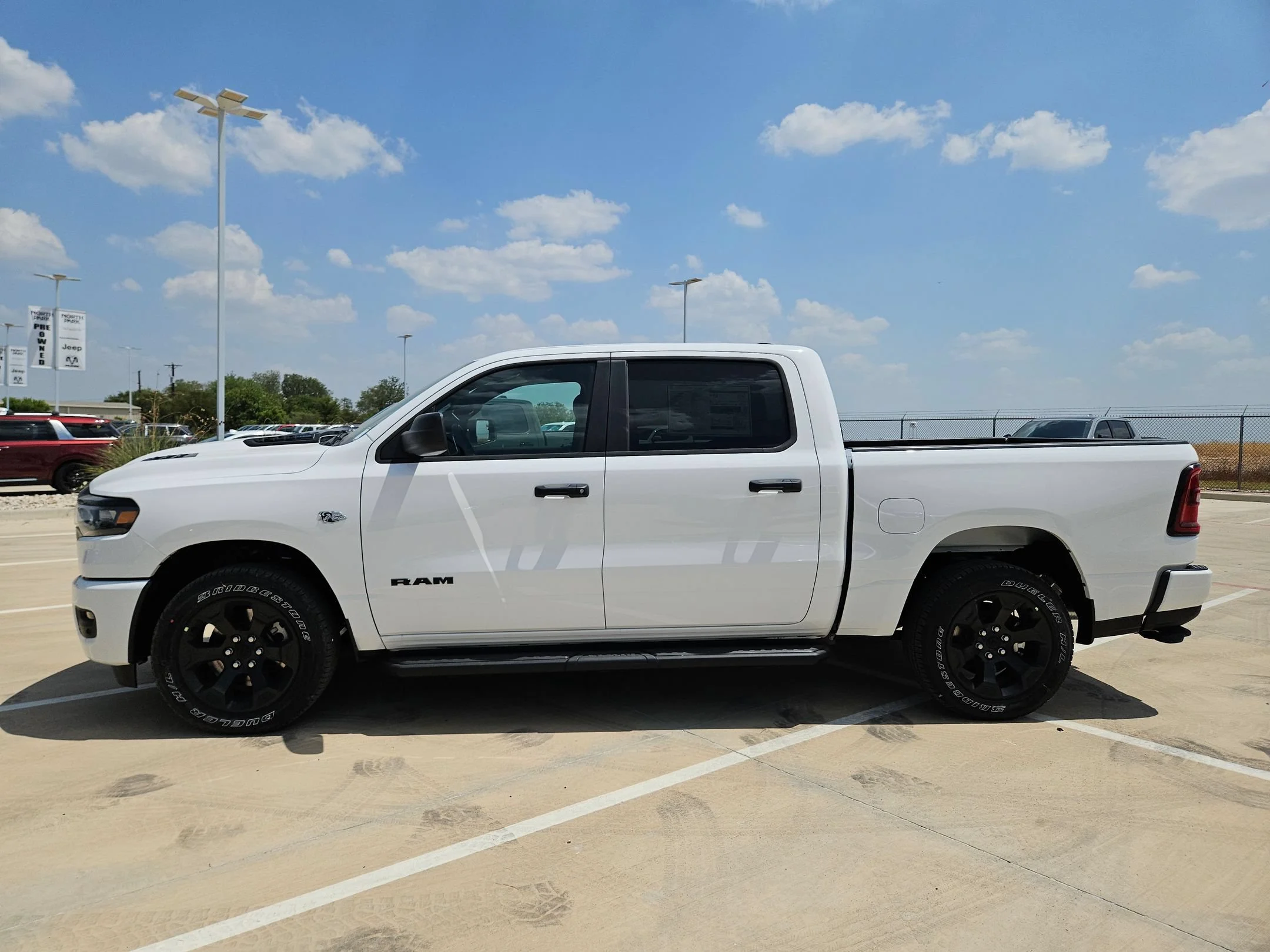 New 2026 Bright White Clearcoat RAM Black Express image 6