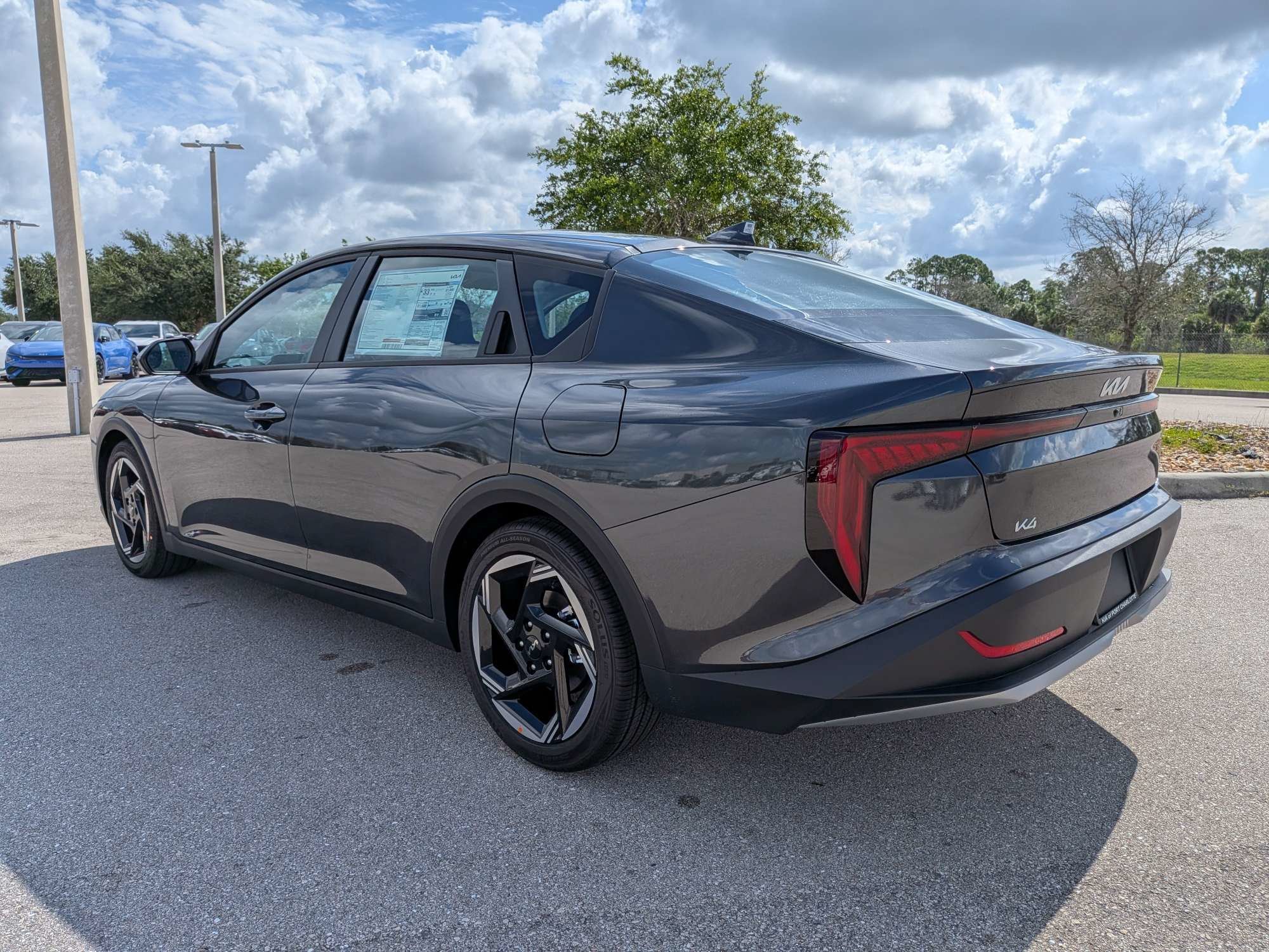 New 2026 Interstellar Gray Kia EX image 7