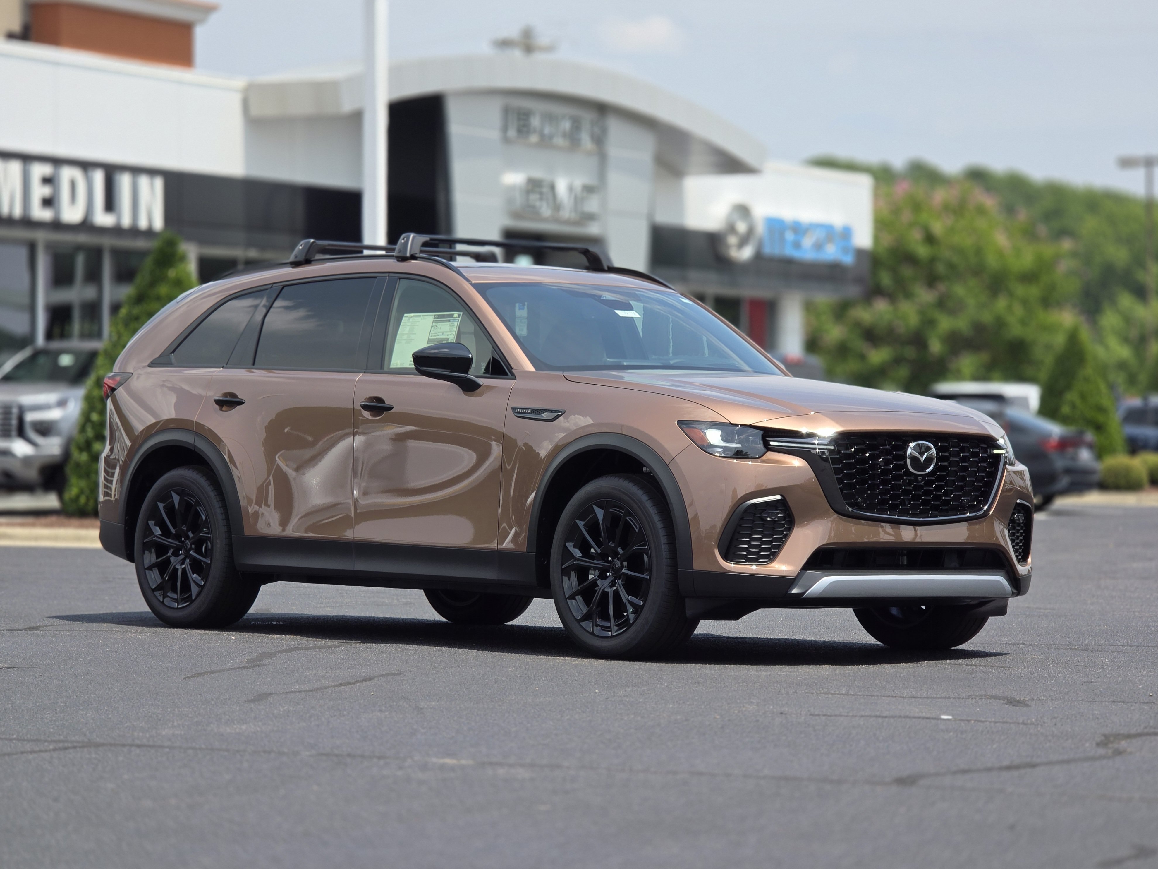 New 2026 Melting Copper Metallic Mazda 3.3 Turbo Premium Plus AWD image 1