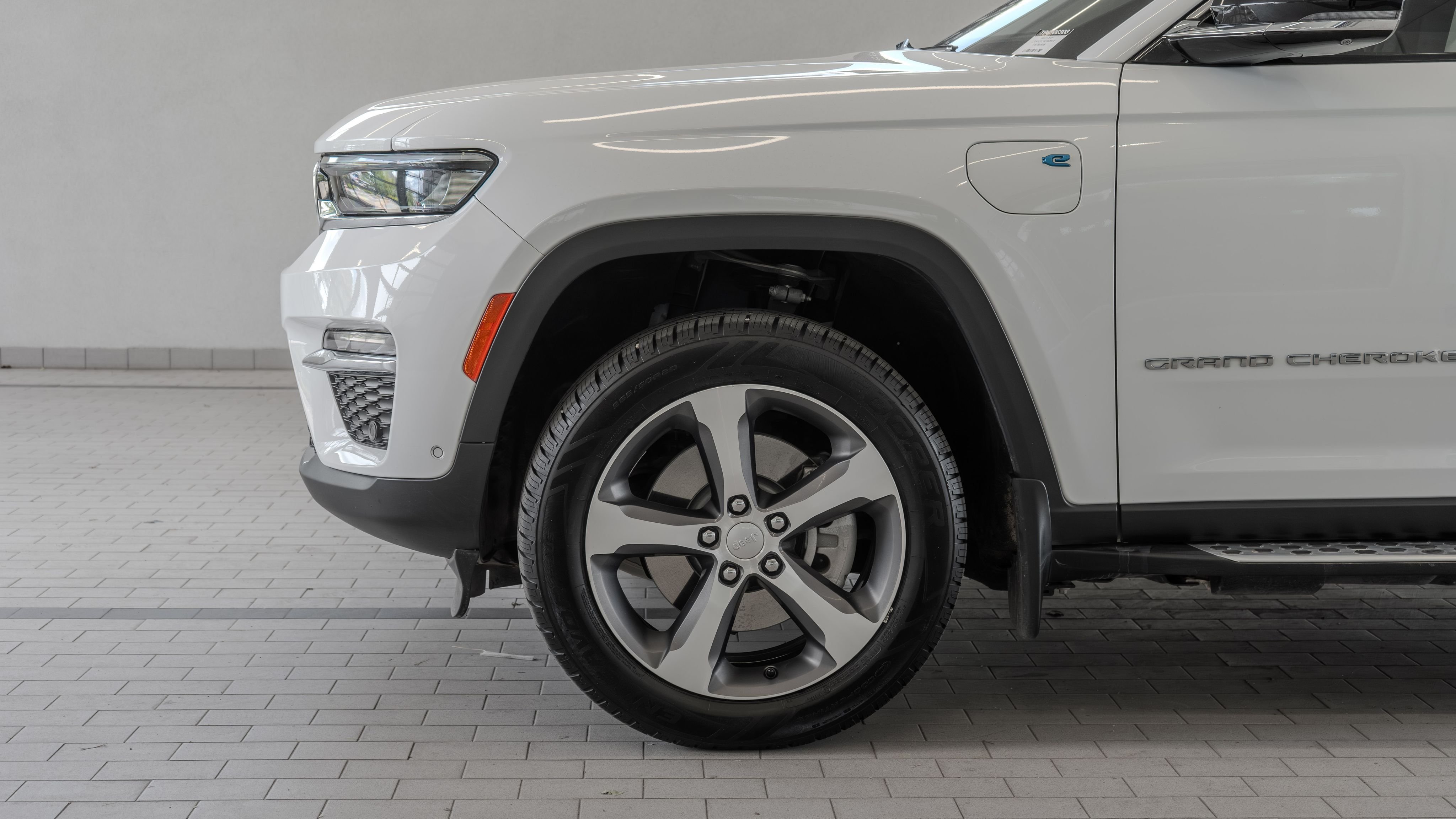 Used 2023 Bright White Clearcoat Jeep 4xe image 4