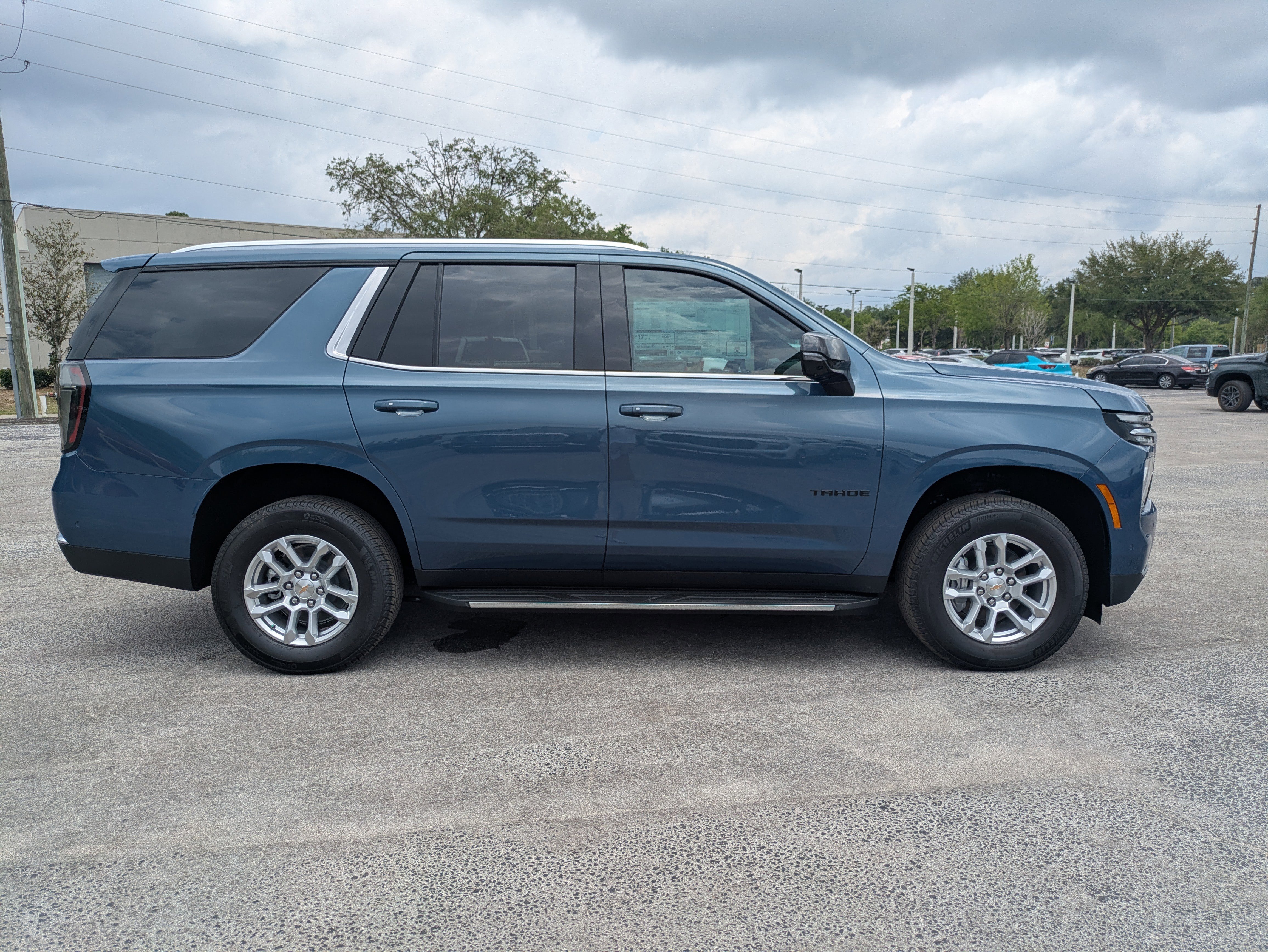 View vehicle photo 3
