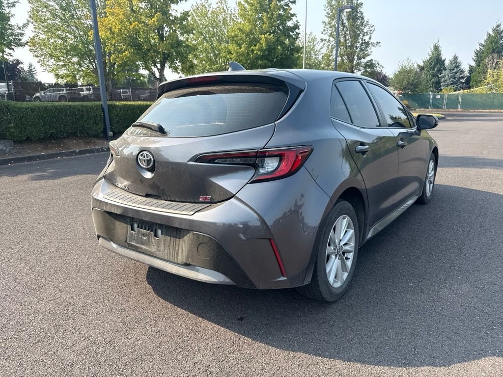 Used 2023 Magnetic Gray Metallic Toyota SE image 7