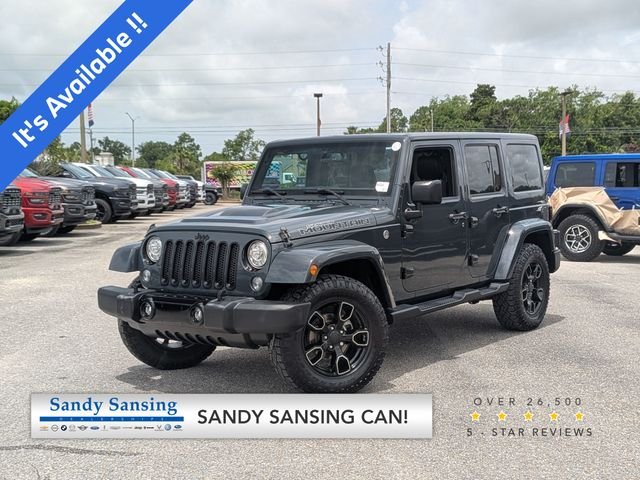 Used 2017 Black Jeep Unlimited Sahara image 1
