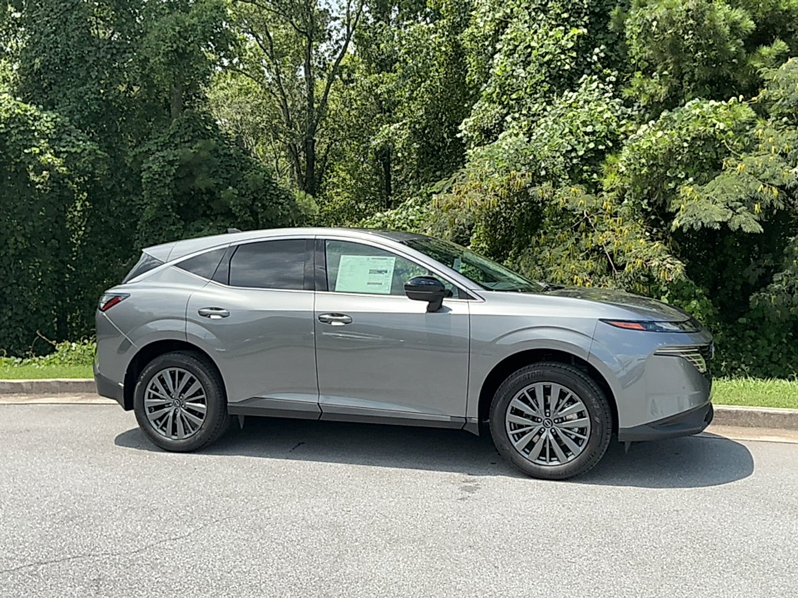 New 2026 Gun Metallic Nissan SL image 1