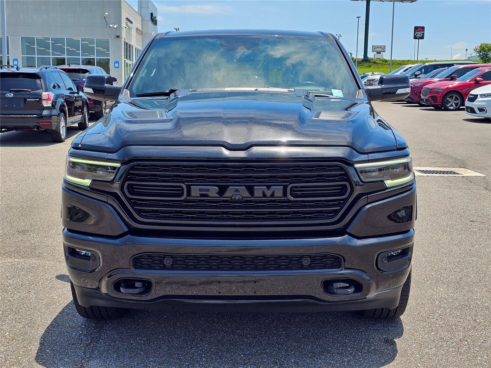 Used 2022 Diamond Black Crystal Pearlcoat Ram Limited image 2