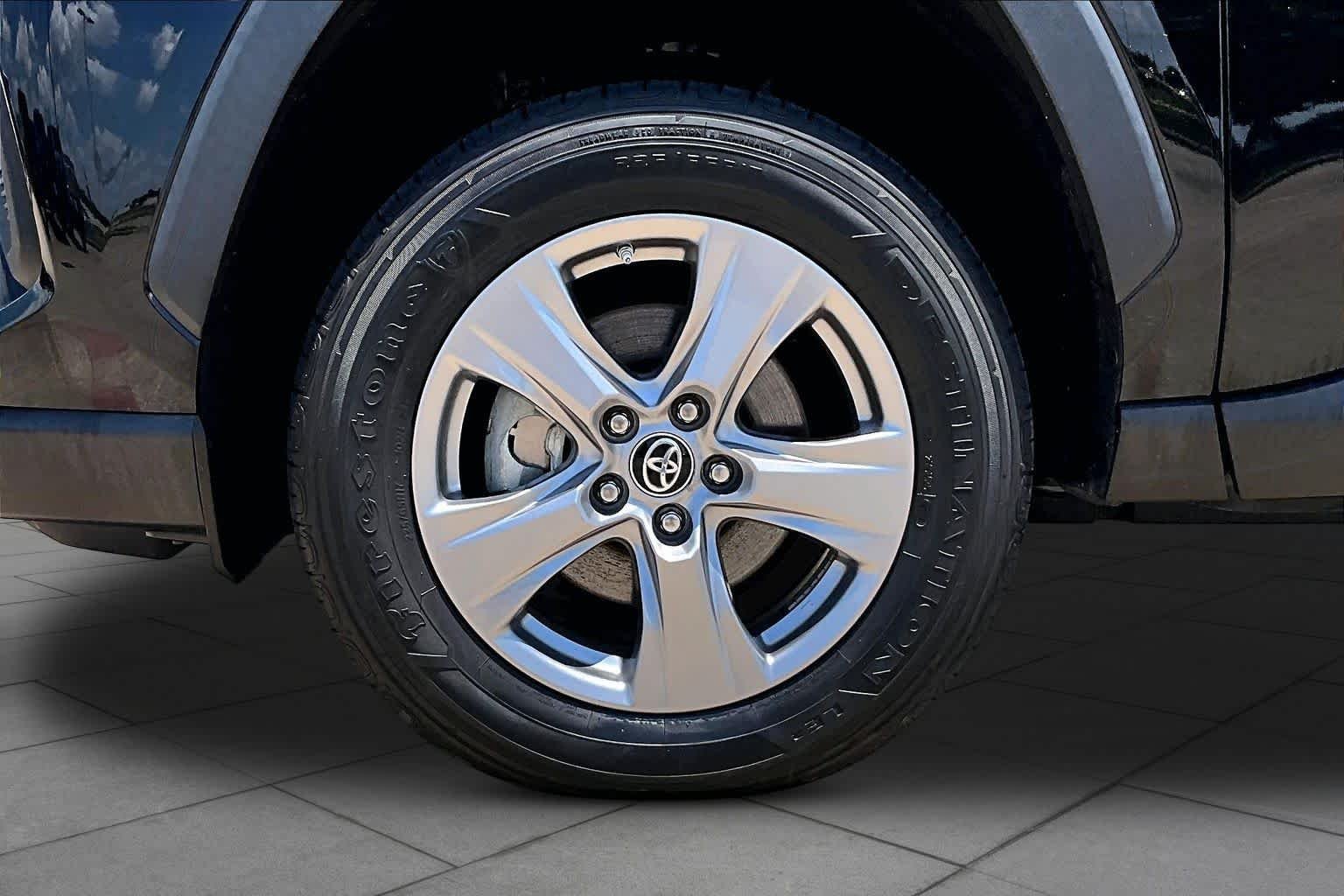 Used 2024 Midnight Black Metallic Toyota Hybrid LE image 11