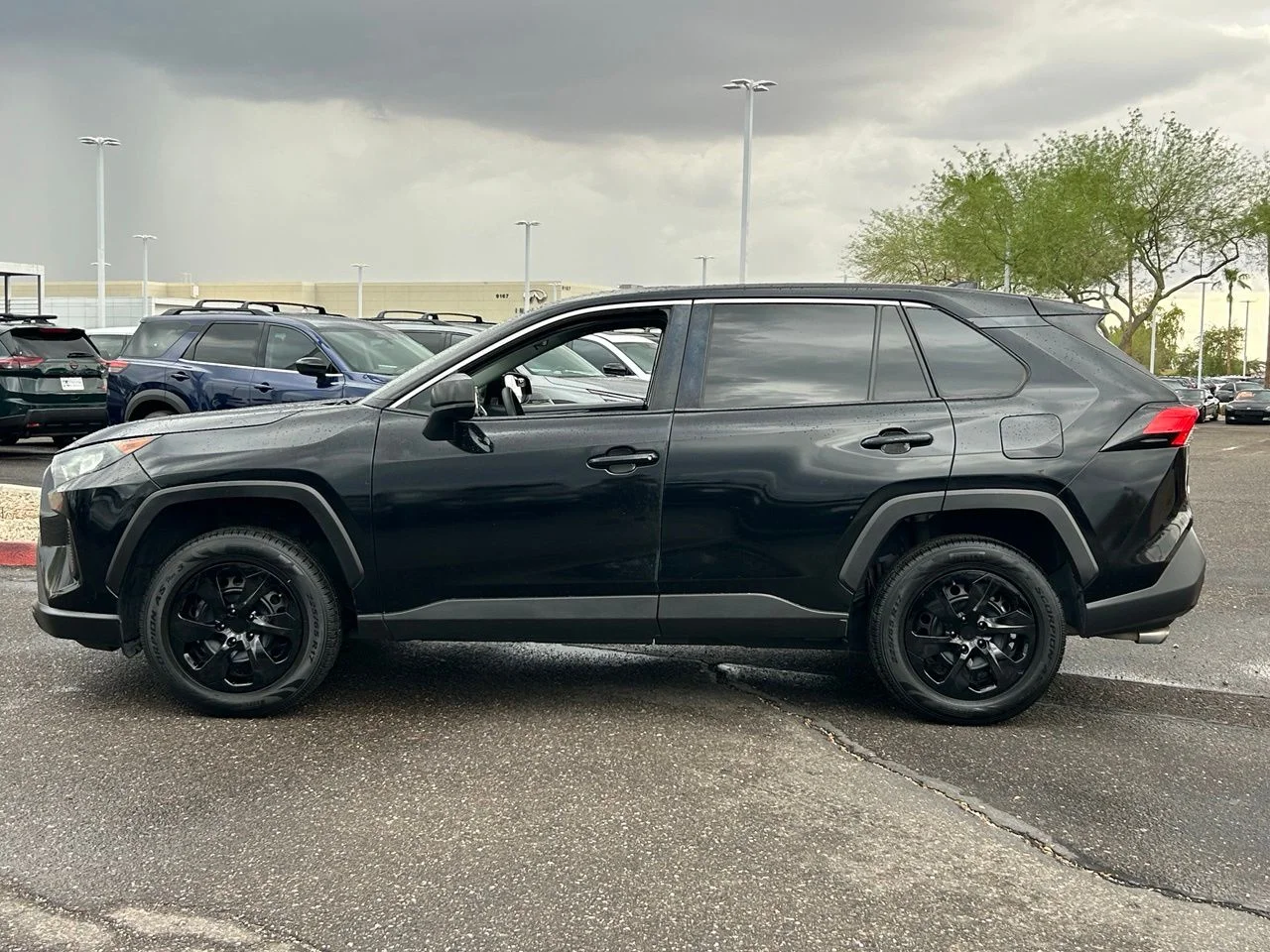 Used 2022 Midnight Black Metallic Toyota LE image 2