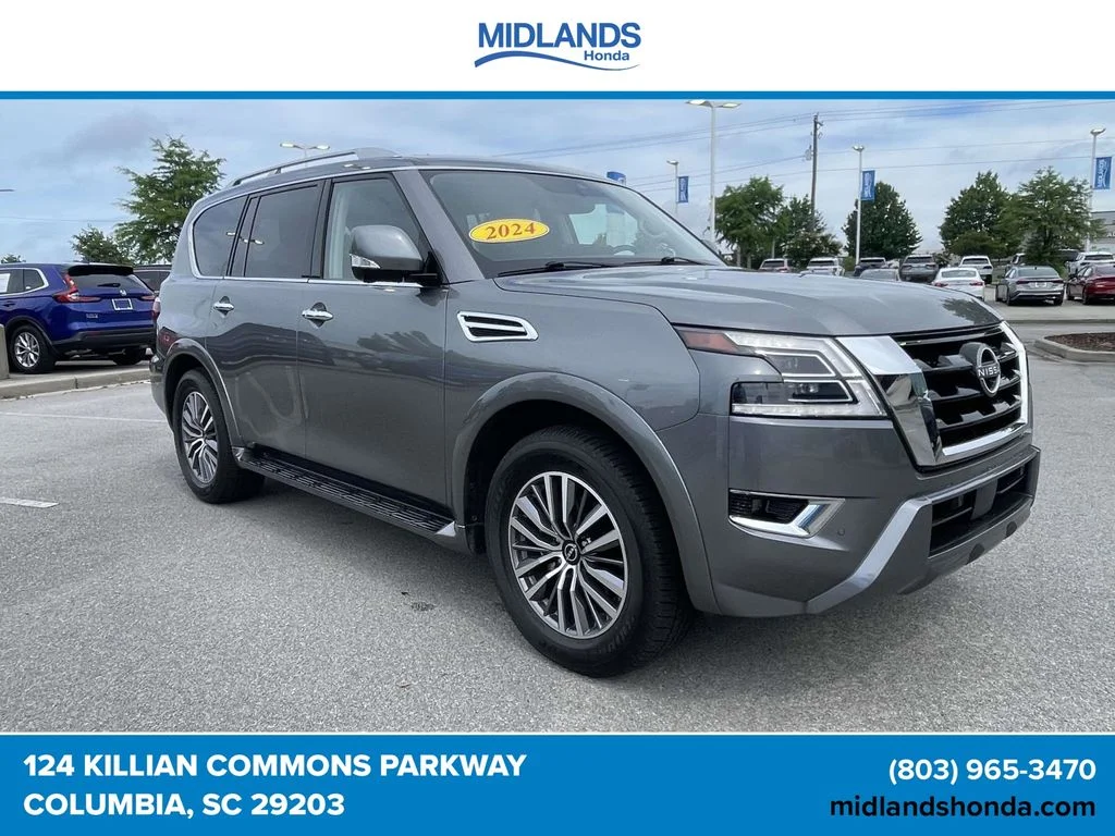 Used 2024 Gun Metallic Nissan SL image 1