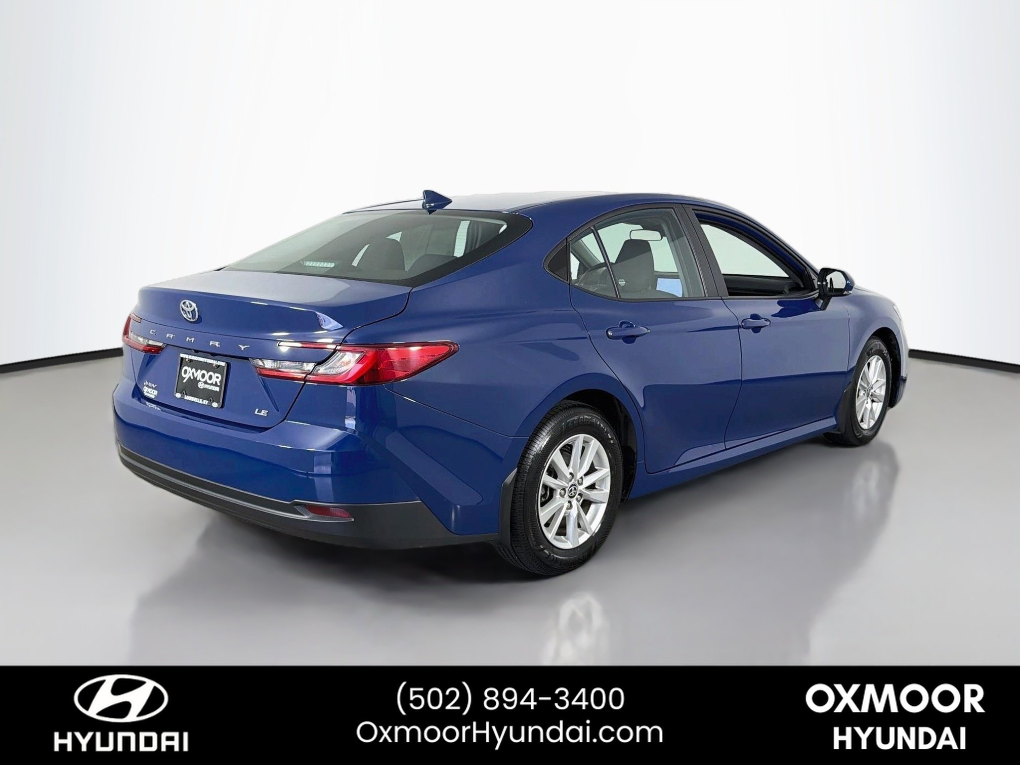 Used 2025 Reservoir Blue Toyota LE image 7