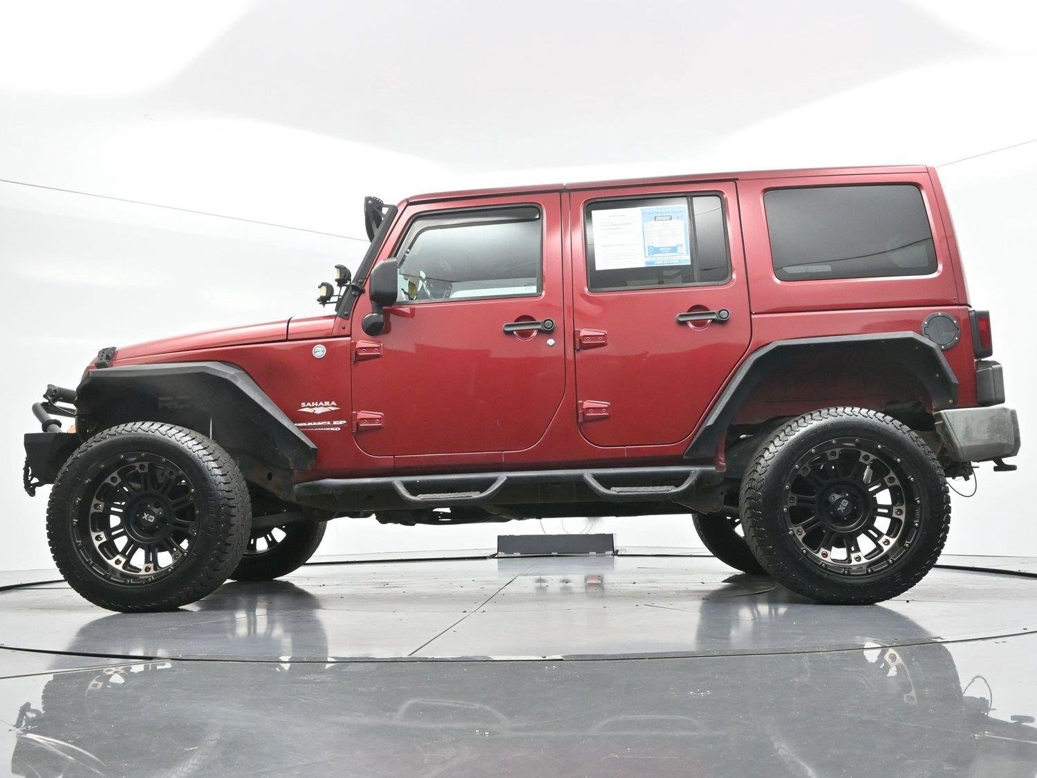 Used 2011 Deep Cherry Red Crystal Pearlcoat Jeep Sahara image 47