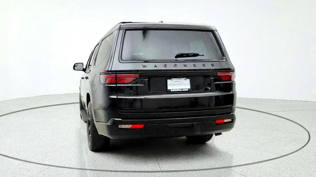 Used 2023 Diamond Black Crystal Pearlcoat Jeep Series II Carbide 4x4 w/ Tri-Pane Roof & Captain
