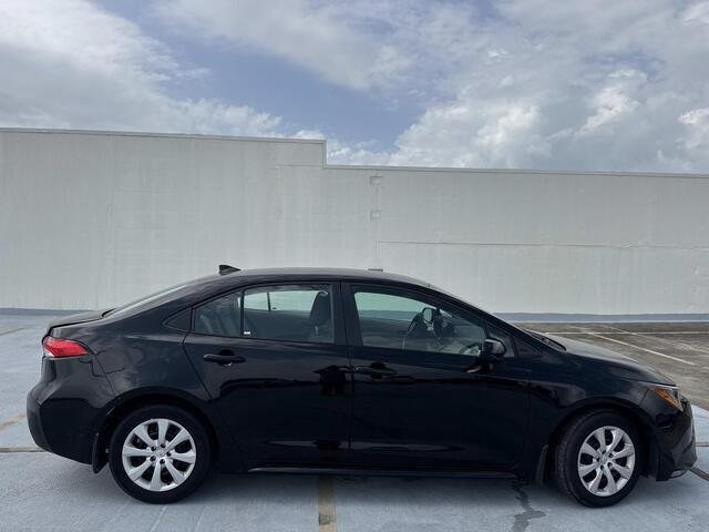 Used 2025 Midnight Black Metallic Toyota LE image 11
