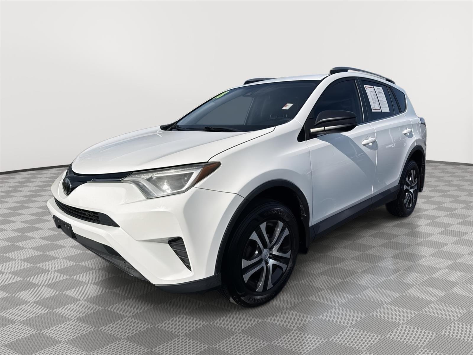 Certified 2018 Toyota RAV4 LE with VIN 2T3BFREV0JW757509 for sale in Kansas City