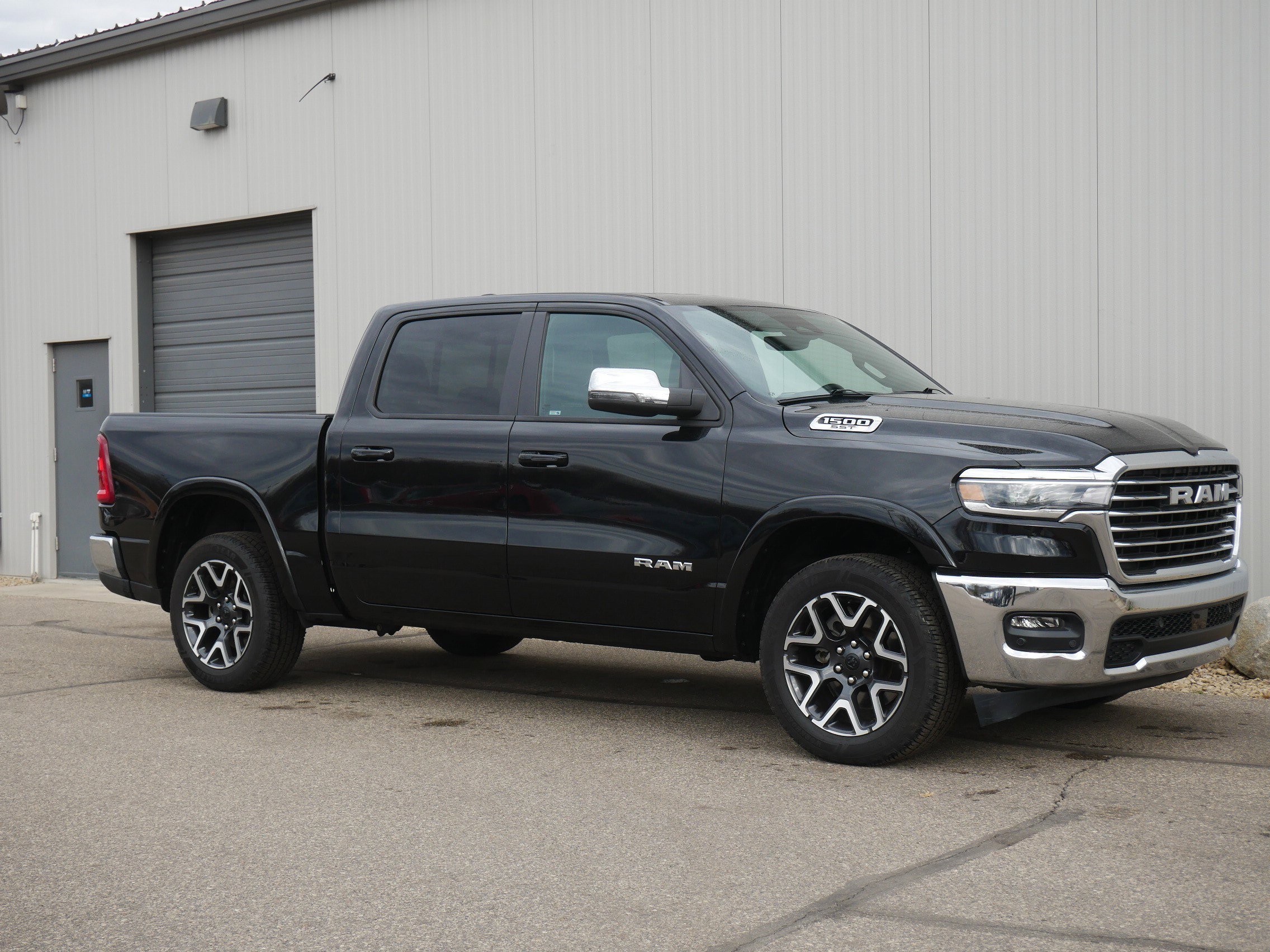 Used 2025 Diamond Black Crystal Pearlcoat Ram Laramie image 7