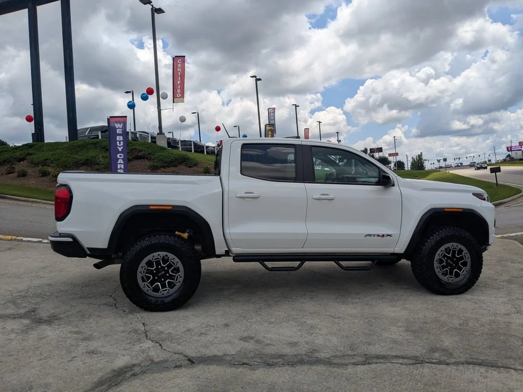 Used 2023 Summit White GMC 4WD AT4X image 4