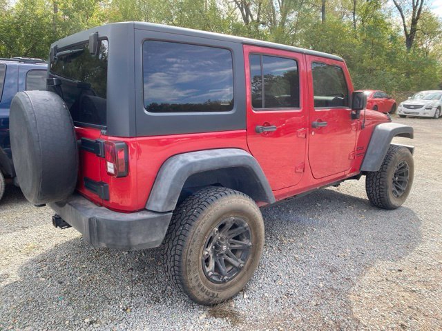 Used 2014 Flame Red Clearcoat Jeep Sport image 4