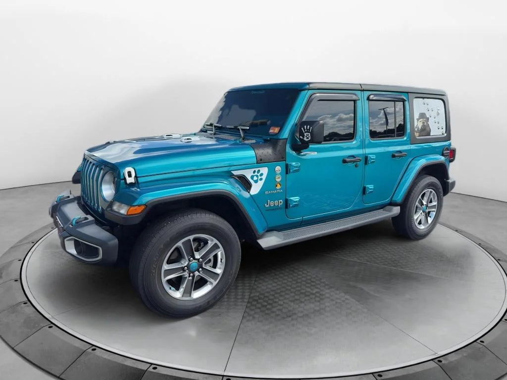 Used 2019 Teal Jeep Sahara 4x4 image 1