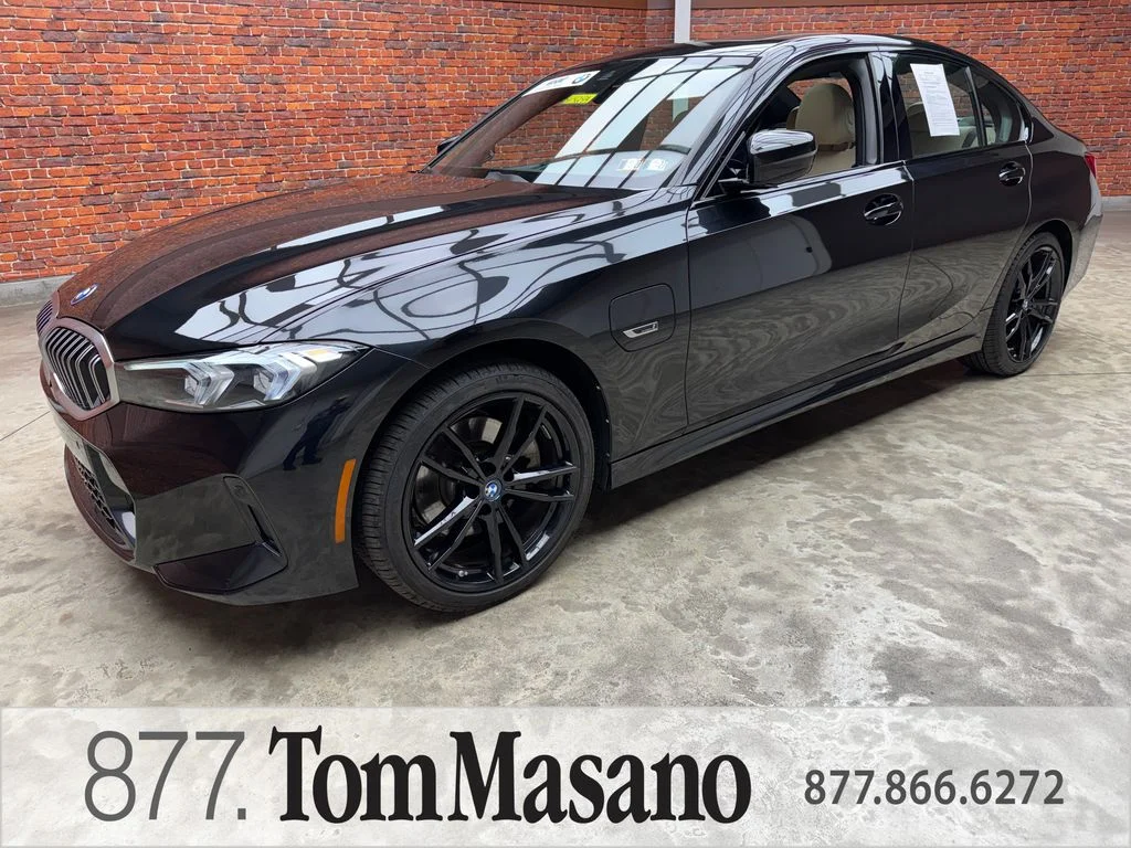 Used 2023 Black BMW 330e xDrive image 1