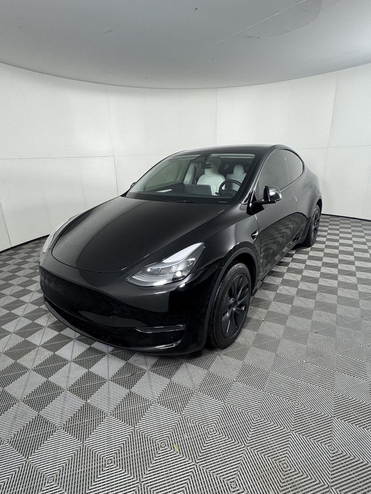 Used 2025 Tesla Model Y Long Range with VIN 7SAYGDEE8SF292126 for sale in Salida, CO
