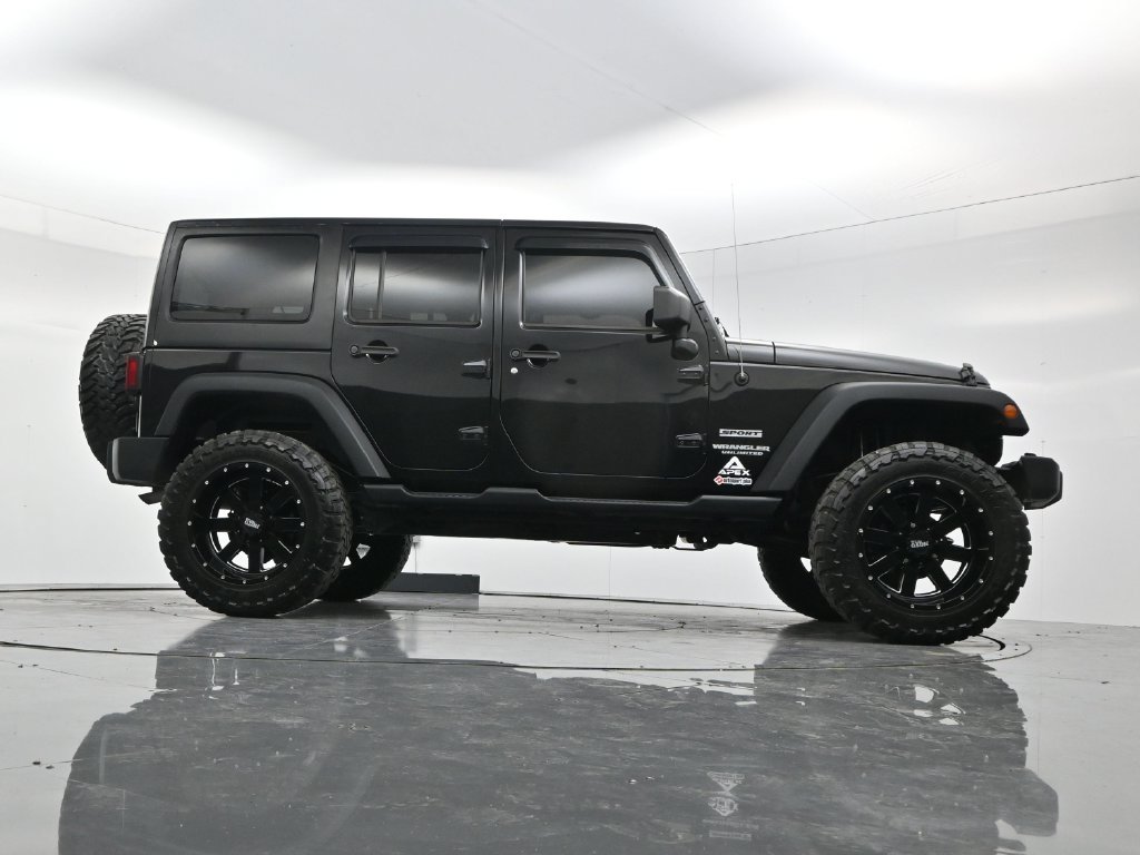 Used 2014 Black Clearcoat Jeep Unlimited Sport image 48