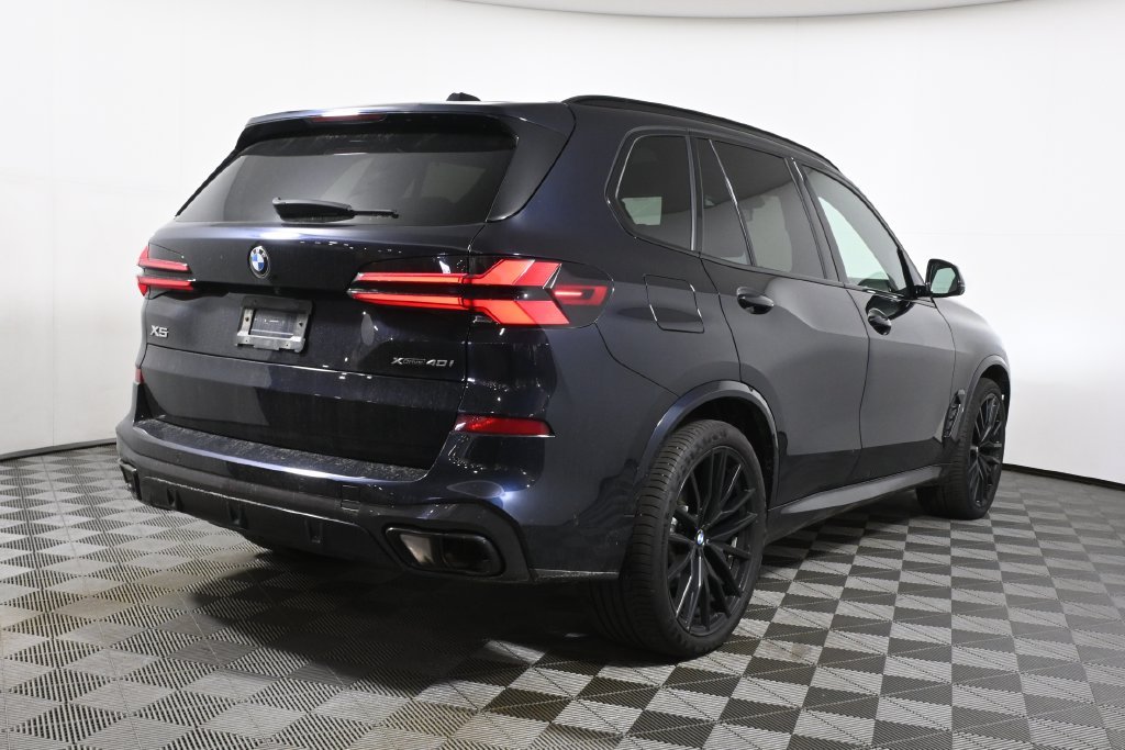Certified Used 2024 Carbon Black Metallic BMW xDrive40i image 11