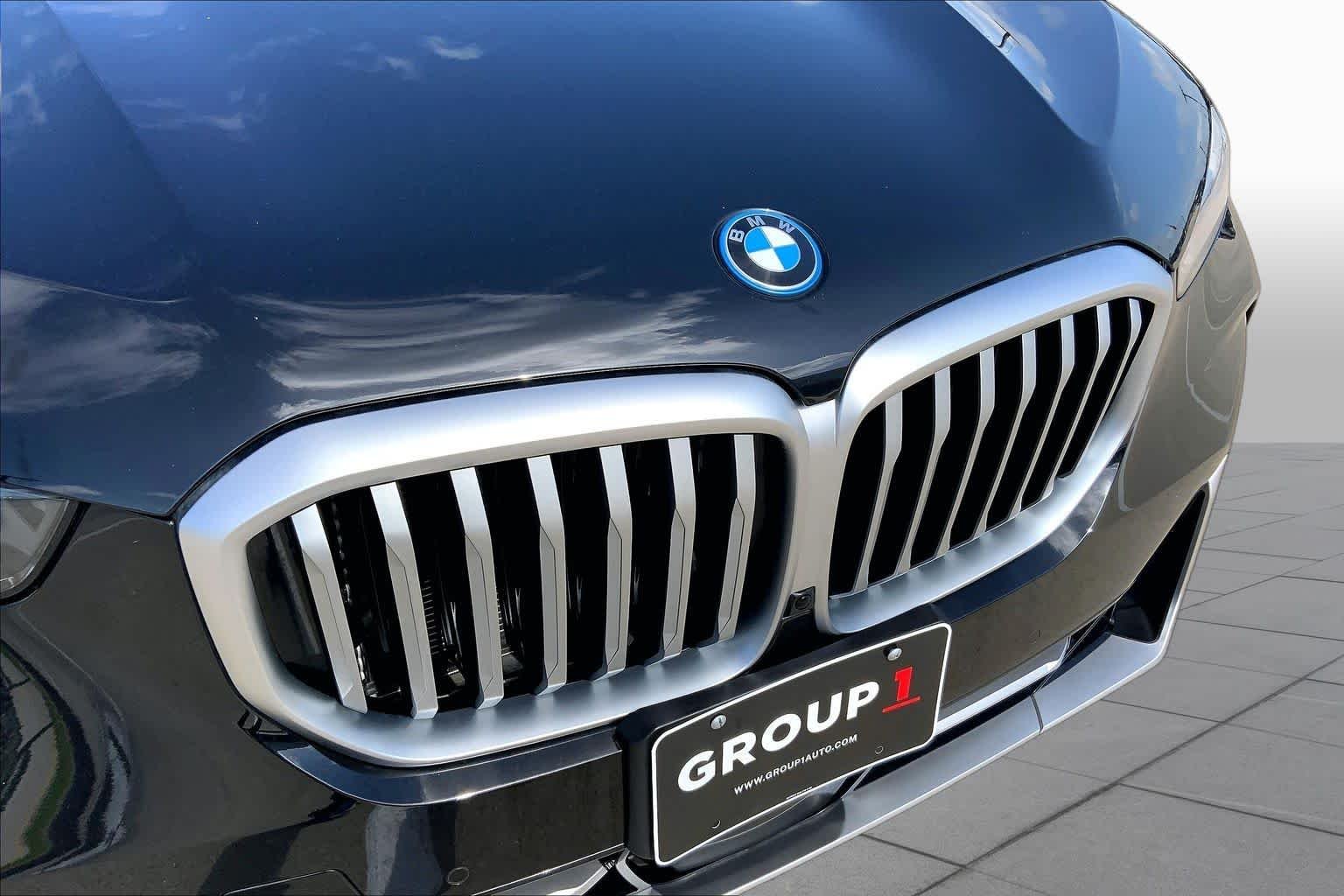 Used 2025 Black Sapphire Metallic BMW xDrive50e image 30