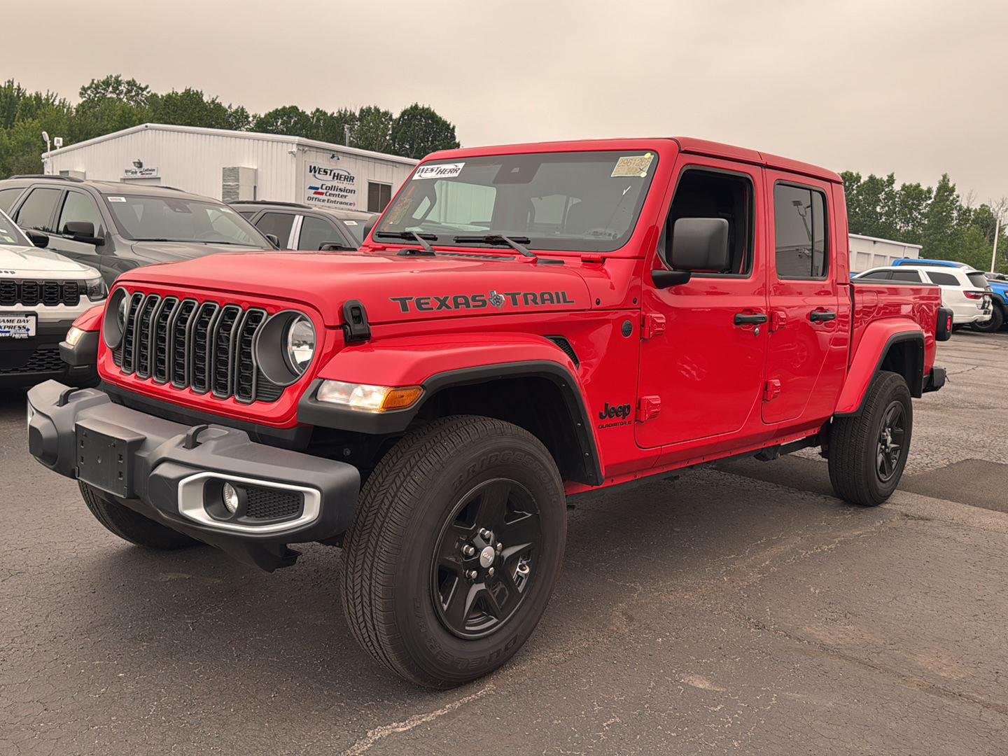 Used 2025 Firecracker Red Clearcoat Jeep Texas Trail image 11