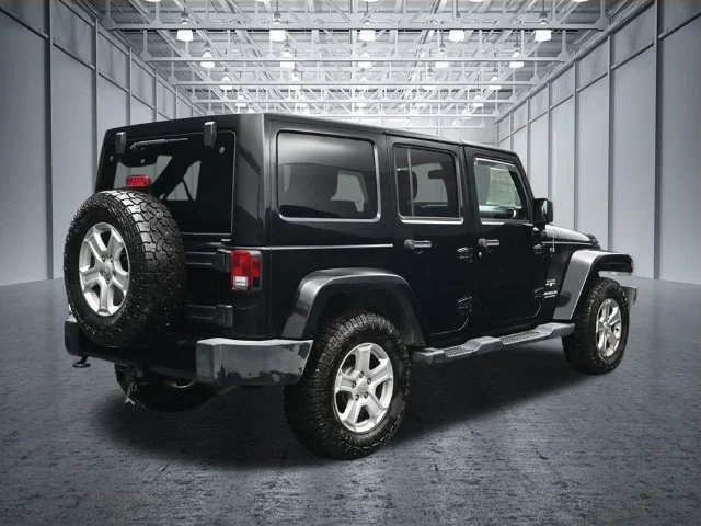 Used 2017 Black Jeep Unlimited Sahara image 6