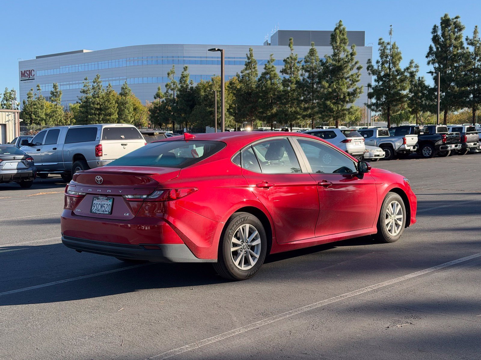 Certified Used 2025 Red Toyota LE image 4
